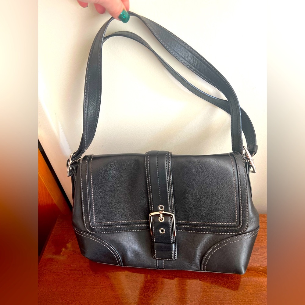 COACH. Black shoulder bag with silver accents